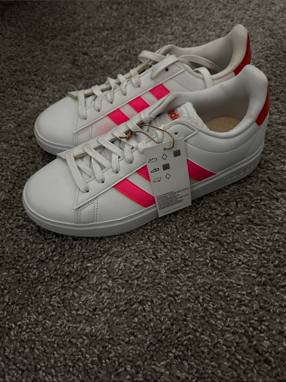 adidas Women’s White Sneakers with Hot Pink Stripes